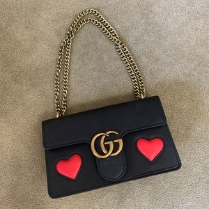 Un authentic Gucci red heart bag